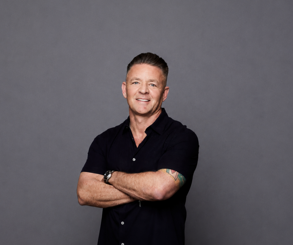 Josiah Lilly, founder of Epic Ceramic & Stone, photographed in a professional portrait.