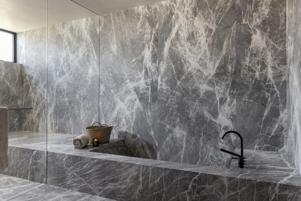 Luxury natural stone bathroom installation by Epic Ceramic and Stone in Orange County California