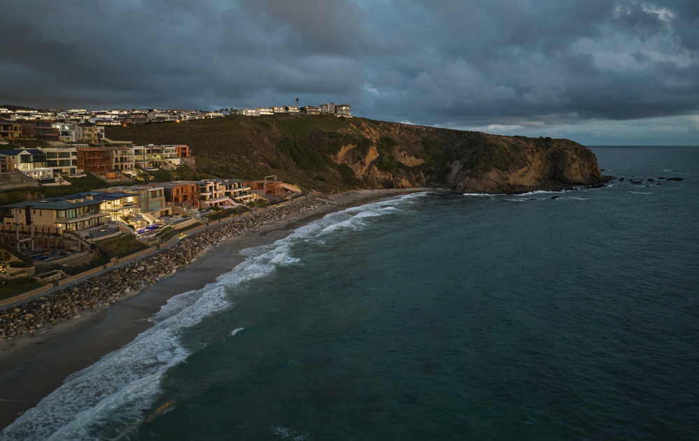 Aerial view of Orange County's coastal communities, including Newport Beach and Laguna Beach, where Epic Ceramic & Stone provides luxury stone and tile installation.